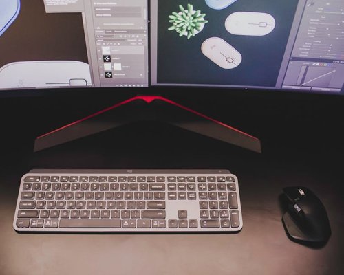 Close-up of a well-lit desktop showing proper distance between monitor and user space